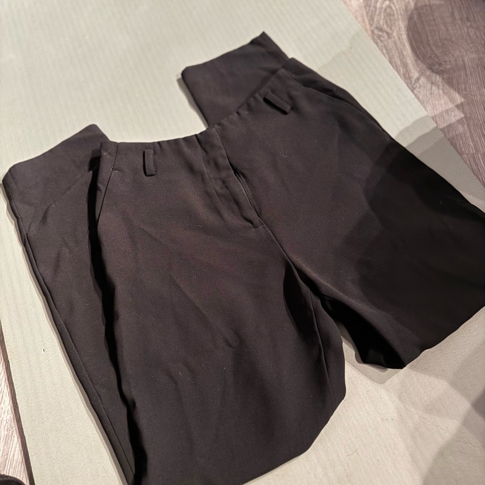 H&M Black Dress Pants with Elegant Silhouette